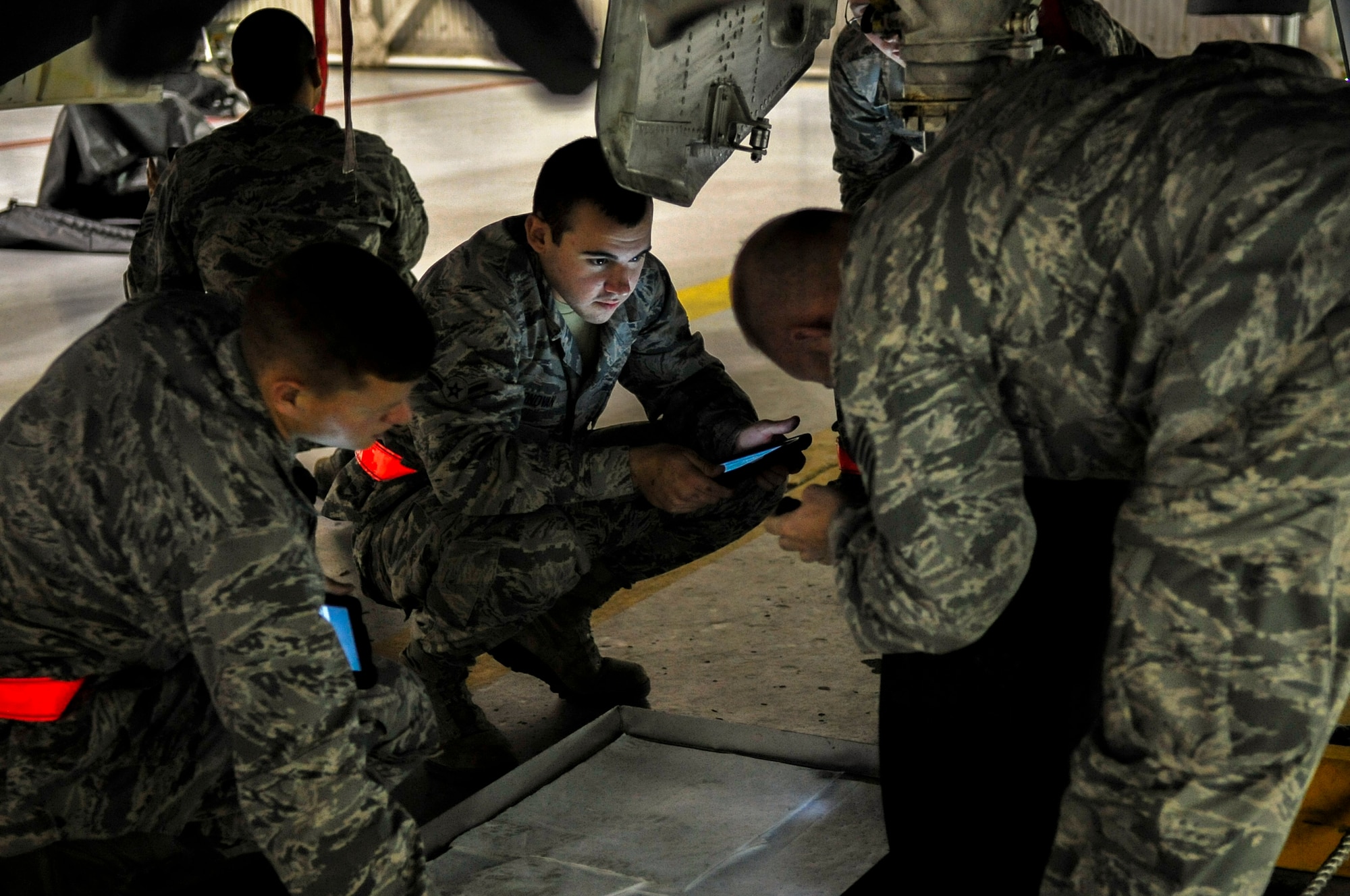 Airmen attending the 372nd Training Squadron Det. 1 J3 course receive hands-on training with the F-15E Strike Eagle at Seymour Johnson Air Force Base, North Carolina, Nov. 10, 2014. The J3 course is 150 hours long and is the last training the students will receive before going to their respective duty stations. During the course, Airmen are taught how to launch and recover aircraft and conduct pre and post-flight inspections on the aircraft. Each year, instructors conduct approximately 40 courses with more than 250 students attending. (U.S. Air Force photo/Airman Shawna L. Keyes)  