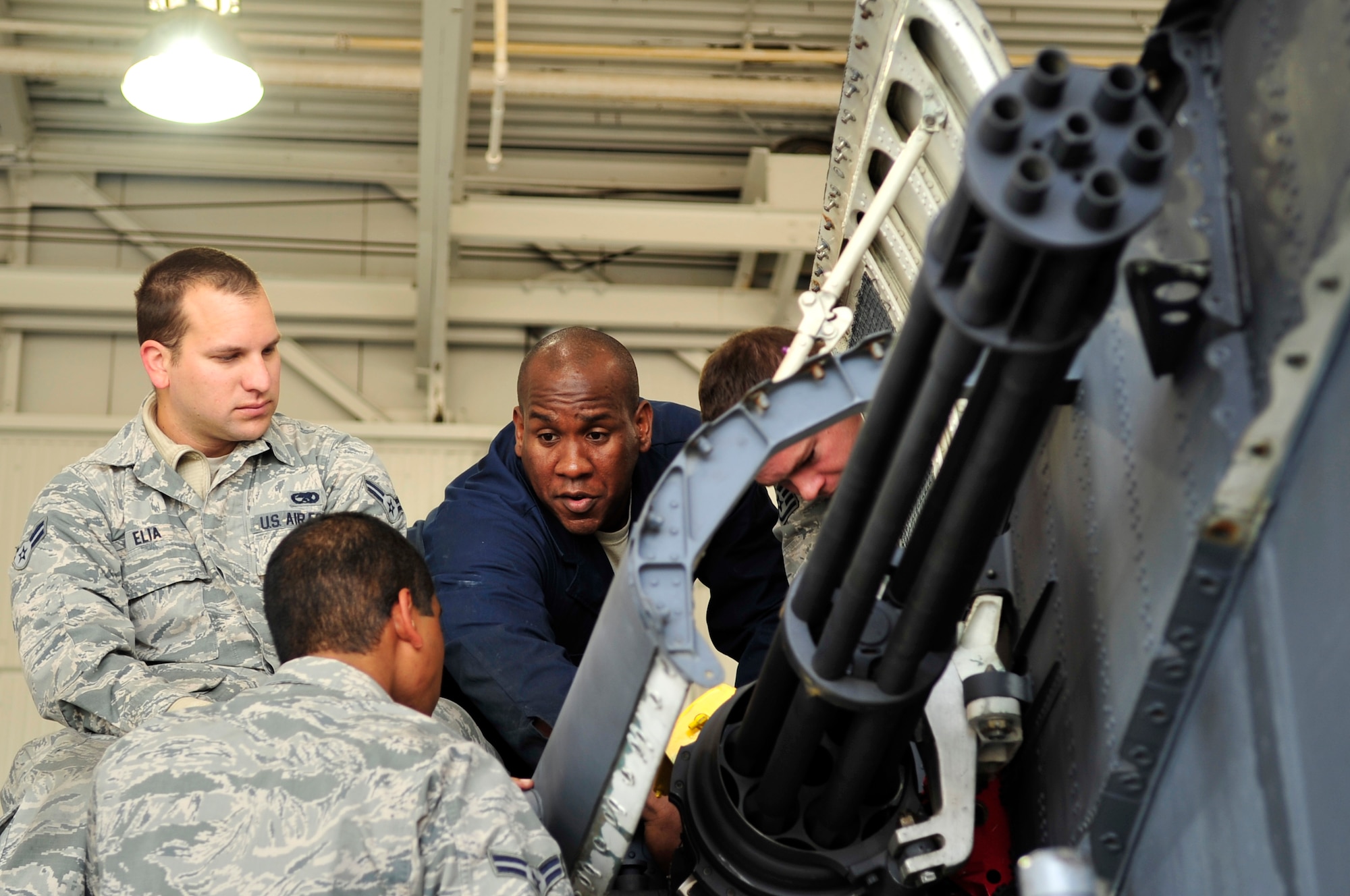 Tech. Sgt. Alrick Bryan (center) 372nd Training Squadron Det. 1 instructor, discusses F-15E Strike Eagle aircraft components with Airmen in a J4 class at Seymour Johnson Air Force Base, North Carolina, Nov. 4, 2014. J4 class sizes are kept small, ranging from two to eight Airmen, so instructors are able to have more one-on-one training with each student. (U.S. Air Force photo/Airman Shawna L. Keyes)