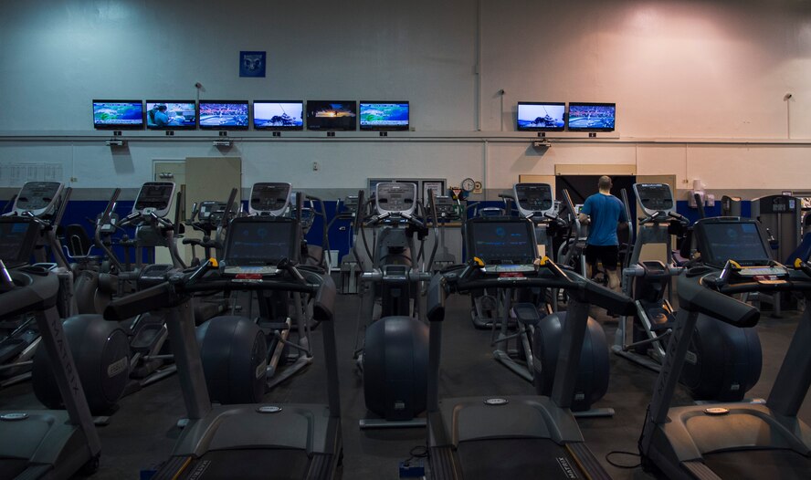 A fan watches Super Bowl XLIX while working out at the Northside Fitness Center on Ramstein Air Base, Germany, Feb. 1, 2015. Members of the Kaiserslautern Military Community watched the super bowl throughout Ramstein, staying up until the early morning to see who would take home the championship. (U.S. Air Force photo/Senior Airman Damon Kasberg)