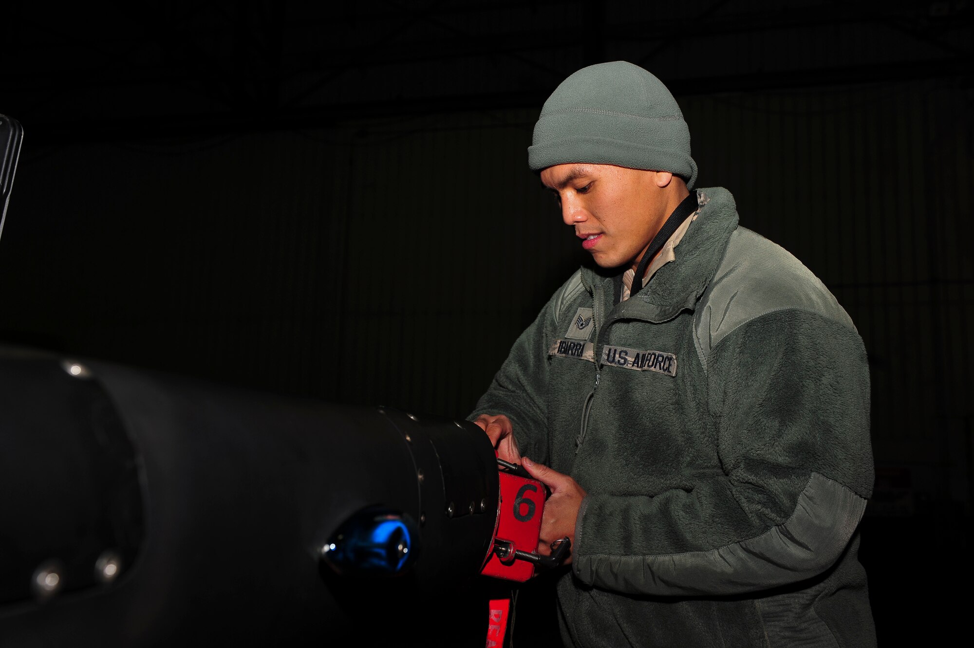 Staff Sgt. Ray Ibarra, 5th Reconnaissance Squadron U-2 avionics systems craftsman, puts on a countermeasure test hood on a U-2 aircraft wing Jan. 9, 2014, at Osan Air Base, Republic of Korea. Ibarra is this week’s Airman Spotlight winner. (U.S. Air Force photo by Senior Airman David Owsianka)