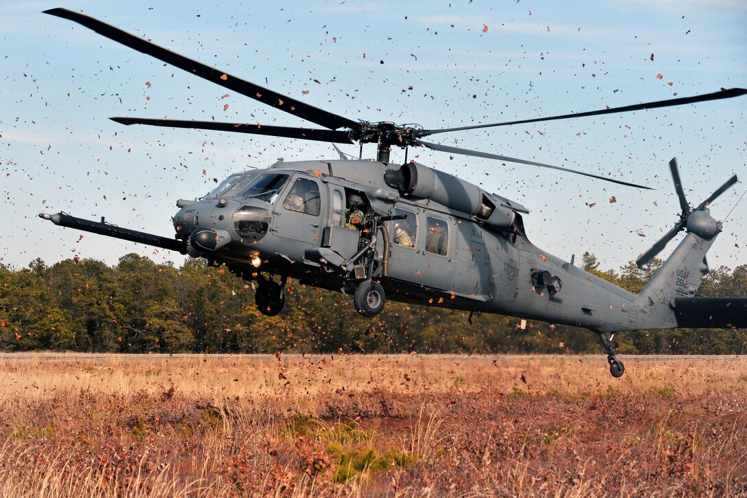 An HH-60 Pave Hawk helicopter prepares to land at the landing zone during combat search and rescue training at the Warren Grove Gunnery Range, N.J., Jan. 23, 2015. The helicopter crew is assigned to the New York Air National Guard's 106th Rescue Wing.