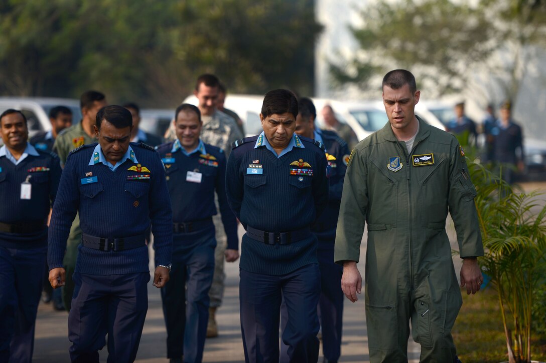 U.S. Air Force Lt. Col. Andrew Campbell, right, talks with Bangladesh air force Air Vice Marshal M. Naim Hassan during exercise Cope South at Bangladesh Air Force Base Bangabandhu, Bangladesh, Jan. 24, 2015. Campbell is commander of  the 36th Airlift Squadron. The exercise helps cultivate common bonds, foster goodwill and improve readiness and compatibility between members of the Bangladesh and U.S. Air Forces.