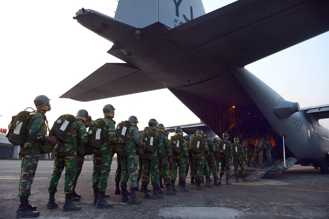 Bangladeshi commandos board a U.S. Air Force C-130H aircraft at Sylhet ...