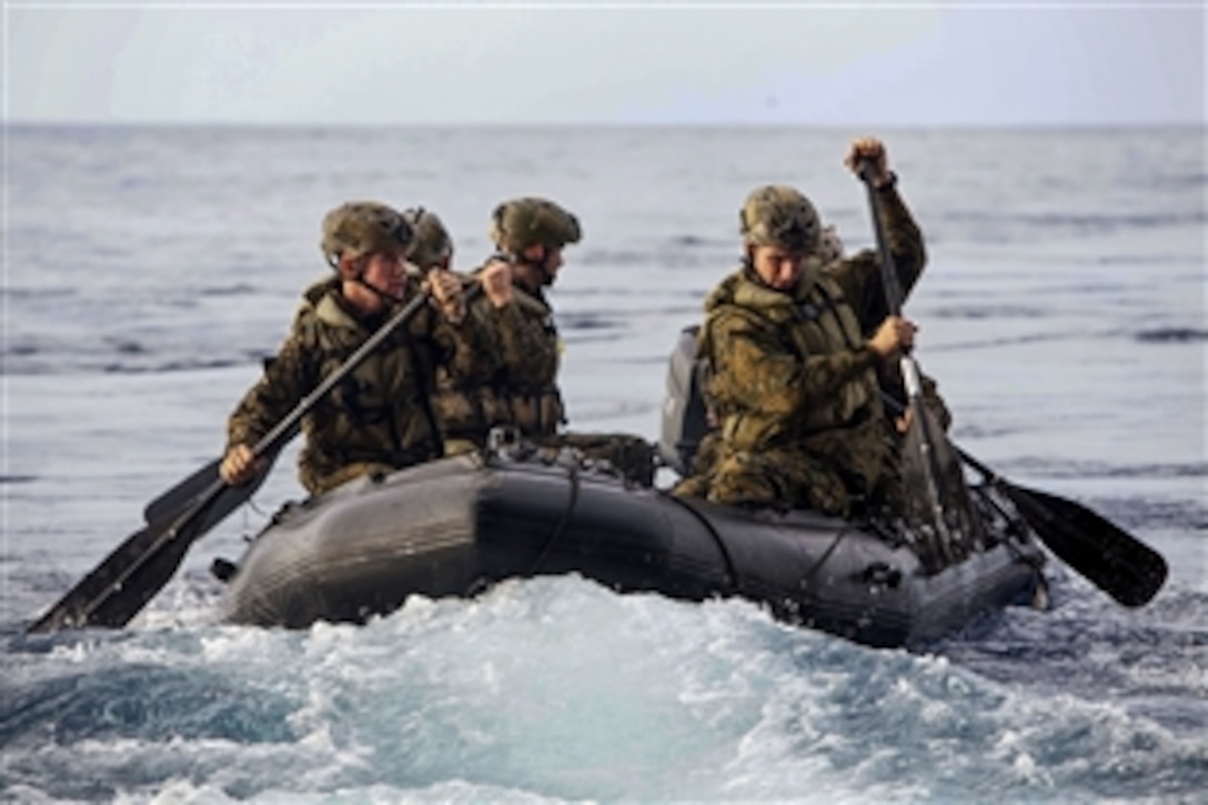 U.S. Marines train with a rubber raiding craft from the USS Bonhomme Richard in Aichi, Japan, Feb. 2, 2015. The Marines and sailors launched and recovered the boat to prepare for their upcoming patrol. The Marines are assigned to Fox Company, Battalion Landing Team, 2nd Battalion, 4th Marine Regiment, 31st Marine Expeditionary Unit.
