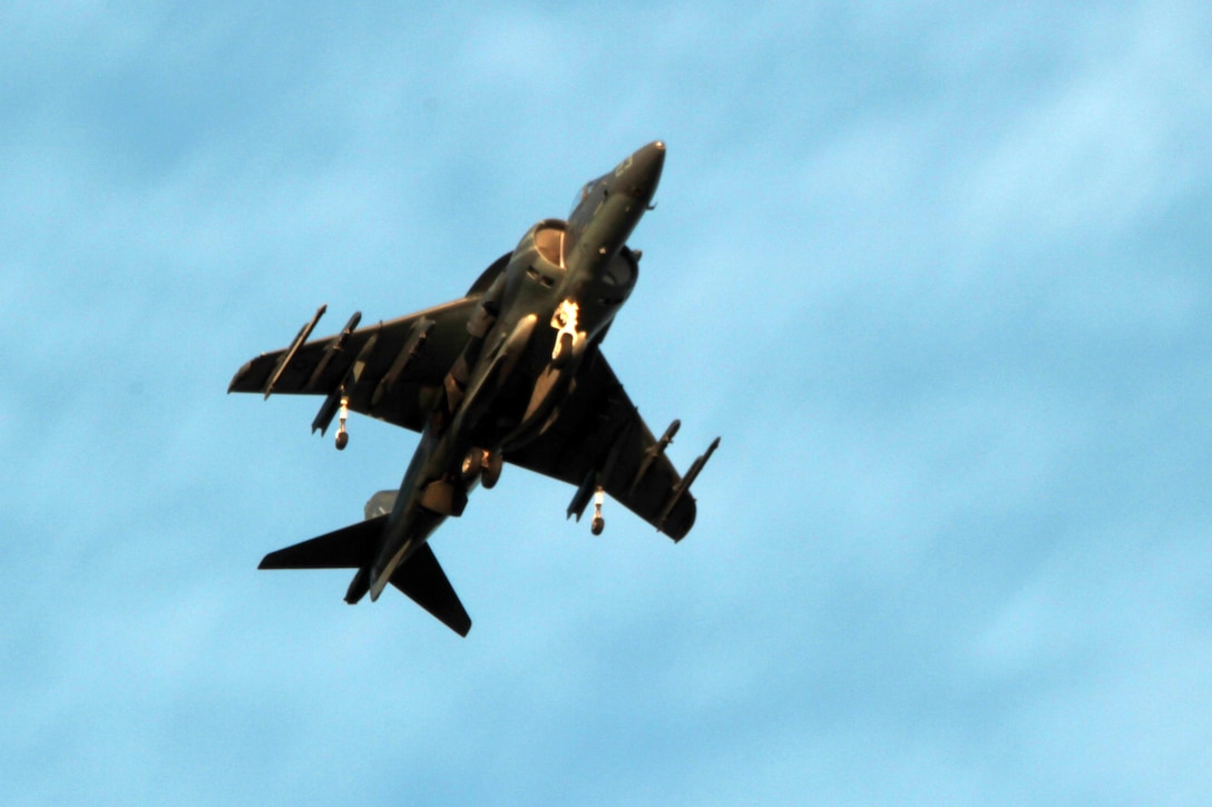 A AV-8B Harrier with 2nd Marine Aircraft Wing flys over the runway toward the setting sun at Marine Corps Air Station Cherry Point, N.C., Feb. 3, 2015. 
Cherry Point is home to 2nd Marine Aircraft Wing and several of its squadrons. Its runways operate 24/7, 365 days each year, and the air station hosts squadrons that specialize in air-to-ground attack support; heavy helicopter lift and transport; electronic warfare; aerial transport and refueling; and sea and land search and rescue.
