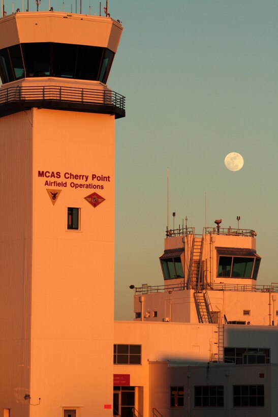 The Air Traffic Control Tower reflects the setting sun light at Marine Corps Air Station Cherry Point, N.C., Feb. 2, 2015. 
The ATC directs air traffic across a large portion of Eastern North Carolina and recently assumed responsibility for a larger area surrounding the air station from Washington Center. 
Cherry Point is home to 2nd Marine Aircraft Wing and several of its squadrons. Its runways operate 24/7, 365 days each year, and the air station hosts squadrons that specialize in air-to-ground attack support; heavy helicopter lift and transport; electronic warfare; aerial transport and refueling; and sea and land search and rescue.