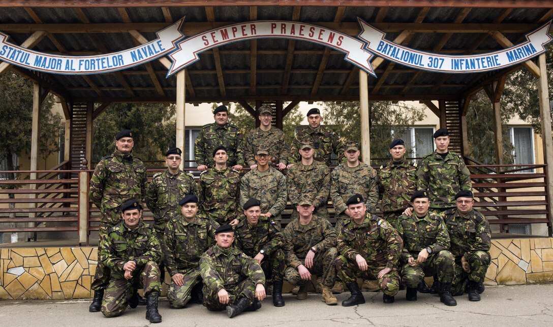 Romanian and U.S. Marines during a Naval Infantry workshop, where they shared their tactics and procedures with the only Romanian Marine battalion about tactics and troop leading procedures and how the U.S. Marines utilize there noncommissioned officers. The Romanians will take what they learned and adapt it in to their own procedures.  