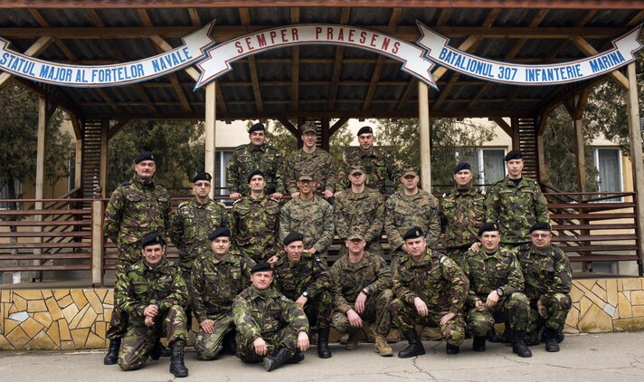 Romanian and U.S. Marines during a Naval Infantry workshop, where they shared their tactics and procedures with the only Romanian Marine battalion about tactics and troop leading procedures and how the U.S. Marines utilize there noncommissioned officers. The Romanians will take what they learned and adapt it in to their own procedures.  