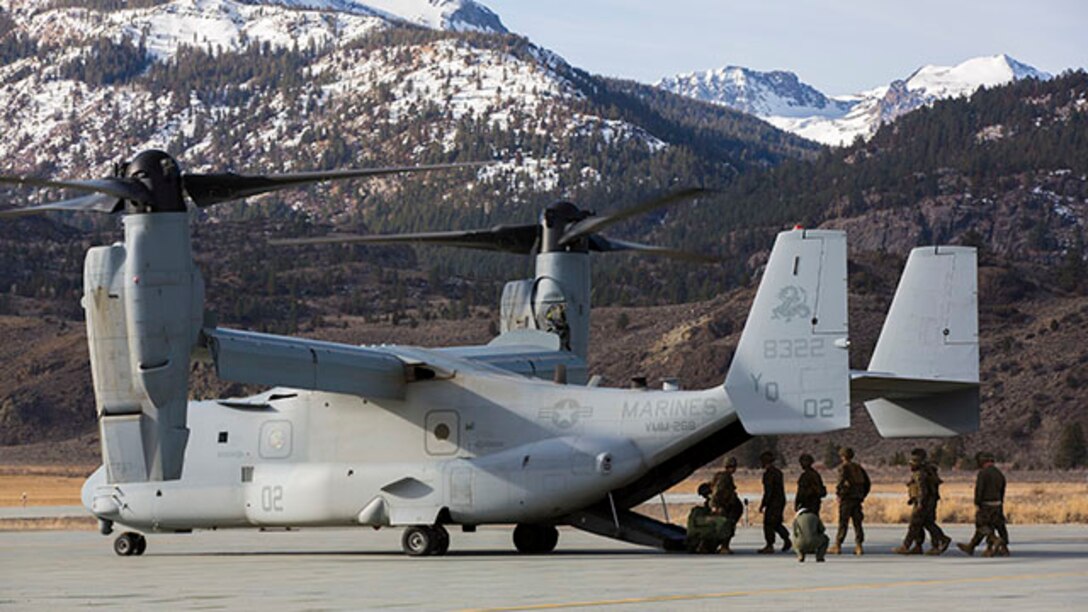 U.S. Marines with Combat Logistics Battalion 26, 2nd Marine Logistics Group, load water and meals onto a V-22 Osprey at the U.S. Marine Corps Mountain Warfare Training Center Bridgeport, Calif., Feb. 2, 2015. MWTC trains Marines across the warfighting functions for operations in mountainous, high altitude, and cold weather environments in order to enhance a unit's ability to shoot, move, communicate, sustain, and survive in mountainous regions of the world. (U.S. Marine Corps photo by Sgt. Anthony L. Ortiz/Released)