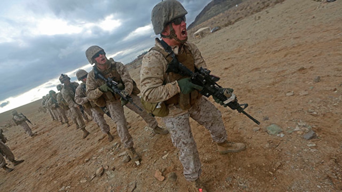 U.S. Marines with Combat Logistics Detachment 1, Combat Logistics Battalion 13, 1st Marine Logistics Group, practice rifle drills during Integrated Training Exercise 2-15 at Camp Wilson on Twentynine Palms, Calif., Jan. 31, 2015. ITX 2-15, executed by Special Purpose Marine Air Ground Task Force 4, is conducted to enhance the integration and warfighting capability of all elements of the Marine Air Ground Task Force. (U.S. Marine Corps photo by Lance Cpl. Kathryn Howard, 1st Marine Logistics Group Combat Camera/Released)