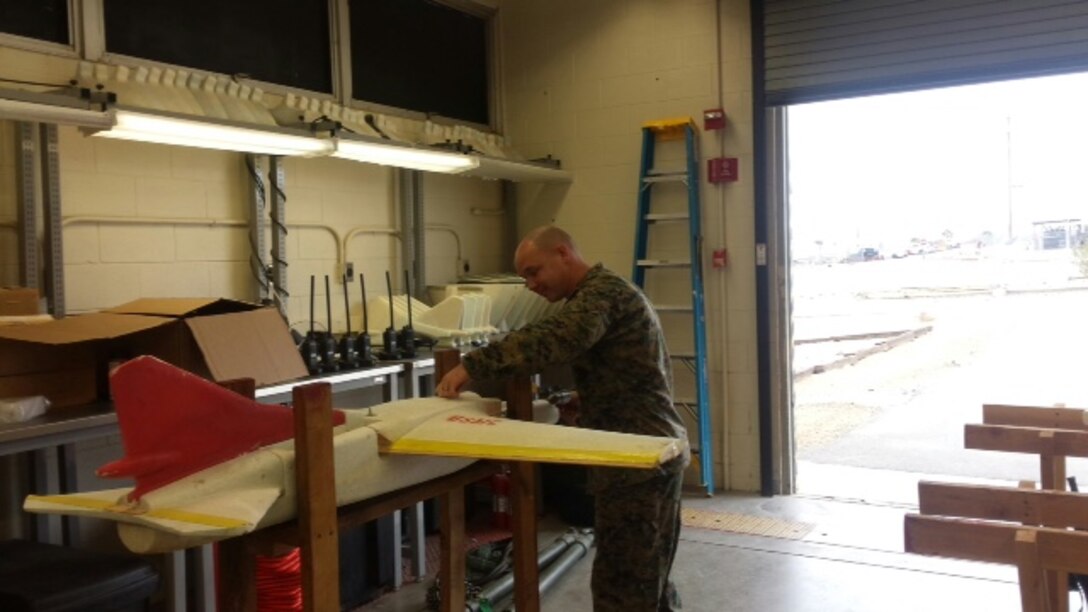 Preparation of final remote controlled Miniature Aerial Target. SSgt Jeremy D. Simms prepares the final RCMAT in preparation of the LAAD Training Section field evolution for class 1-15. 