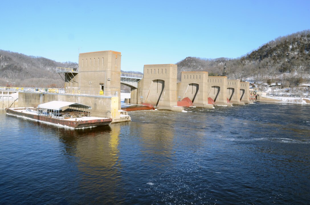 Dam 5A on the Mississippi River. To the far right is a temporary ramp that was constructed to load barges to transport large or heavy material across the Mississippi River to the lock chamber for the Lock and Dam 5A Winter Maintenance. Lock 5A was closed to navigation on Dec. 1, 2014, in order to complete the necessary work by March 9, 2015.