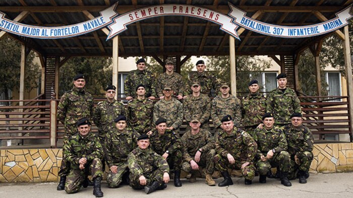 Romanian and U.S. Marines during a Naval Infantry workshop, where they shared their tactics and procedures with the only Romanian Marine battalion about tactics and troop leading procedures and how the U.S. Marines utilize there noncommissioned officers. The Romanians will take what they learned and adapt it in to their own procedures. (U.S. Marine Corps photo by Lance Cpl. Ashton C. Buckingham)