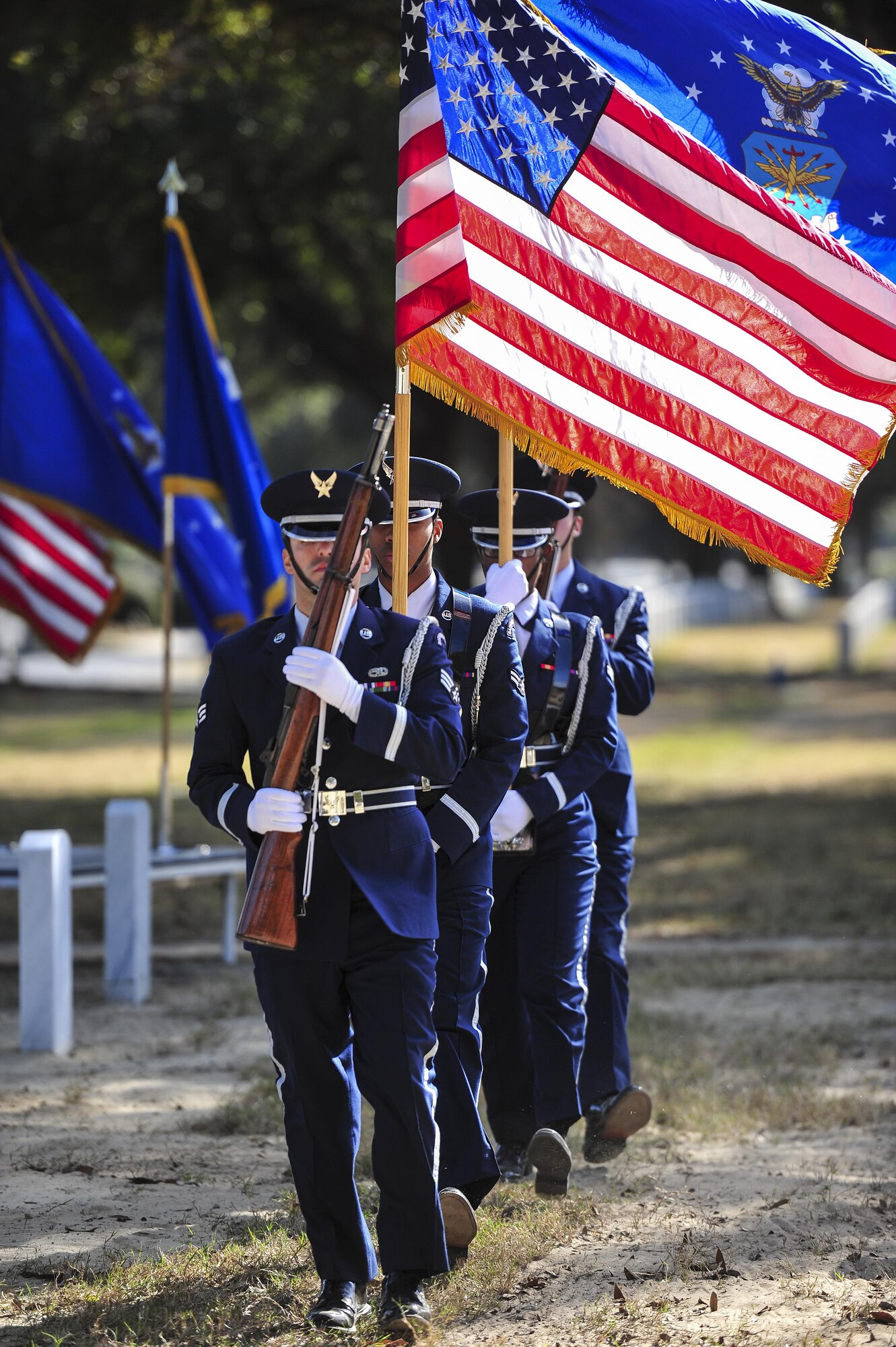 Hurlburt Field Honor Guard members post the colors during a remembrance ceremony at Barrancas National Cemetery on Naval Air Station Pensacola, Fla., Jan. 31, 2015. The ceremony honored the crew of AC-130H Spectre, Spirit 03, which was shot down Jan. 31, 1991, during the Battle of Khafji. (U.S. Air Force photo/Airman 1st Class Jeff Parkinson)