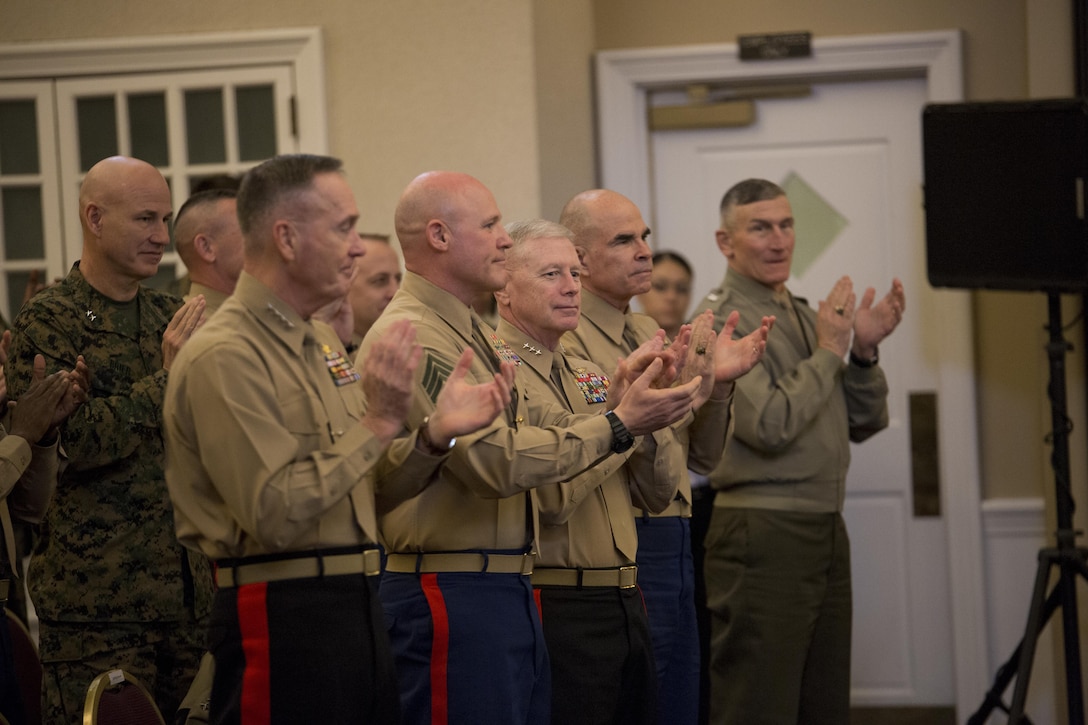 The Commandant of the Marine Corps Gen. Joseph F. Dunford Jr., and Sergeant Major of the Marine Corps Sgt. Maj. Michael P. Barrett and other senior leaders applaud finalists at the Commandant of the Marine Corps 2014 Combined Awards Ceremony at the Clubs at Quantico in Quantico, Va., Jan. 29, 2015. The ceremony recognized superior recruiters, drill instructors, combat Instructors, Marine security guards, career planners and Semper Fit male and female athletes of the year. Career planners play a critical role in retaining high-quality Marines, an issue that the Commandant highlighted in his recently released planning guidance. (U.S. Marine Corps photo by Cpl. Gabrielle Quire/Released)