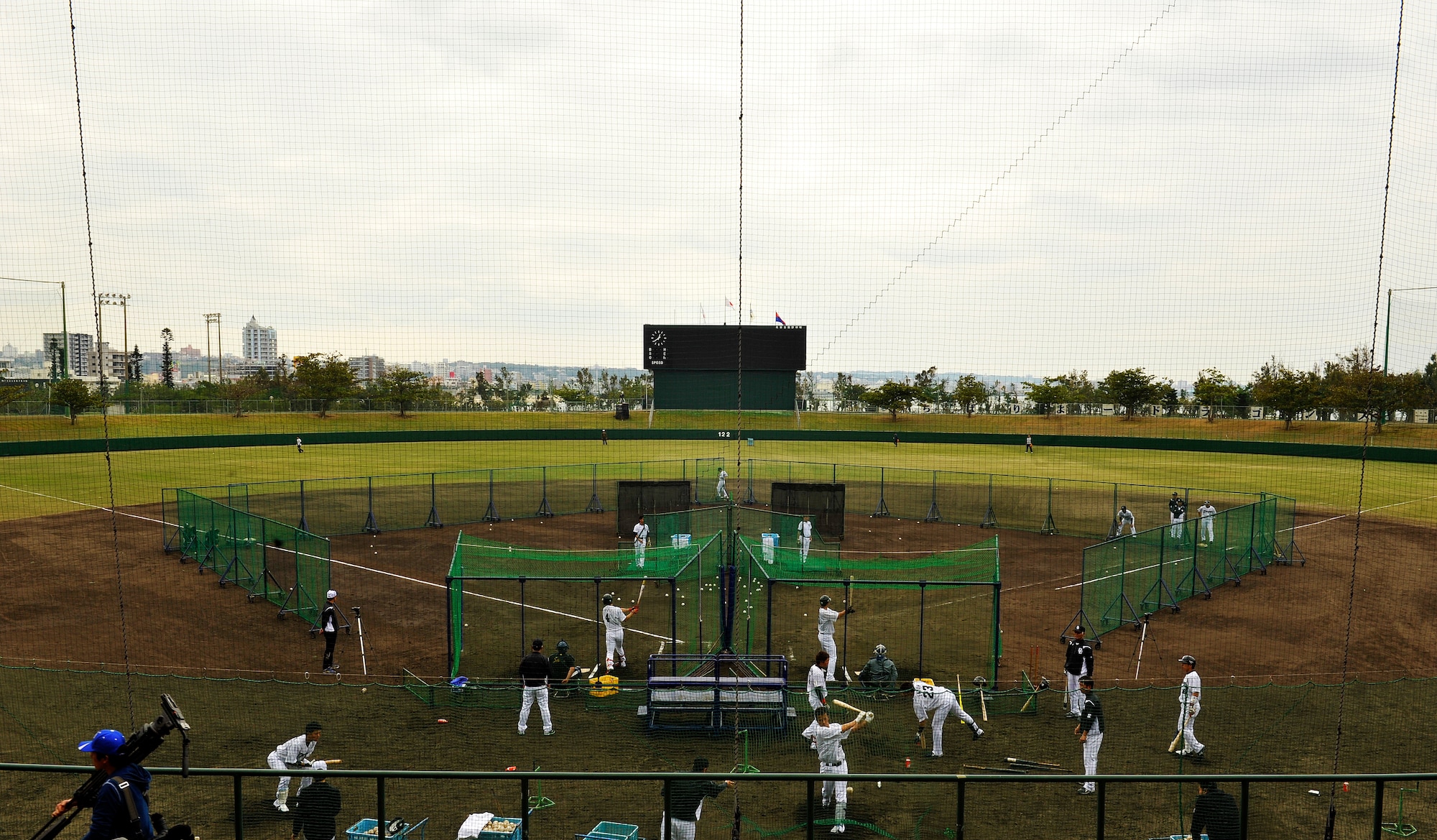 Players from the Chunichi Dragons work on their batting skills during spring training camp at the Chatan Park Baseball Stadium, Okinawa, Japan, Feb. 2, 2015. Professional baseball camp is for people who want to see their favorite players up close and possibly to speak with them directly. Also, it is a good opportunity to get photographs and autographs. (U.S. Air Force photo by Naoto Anazawa)