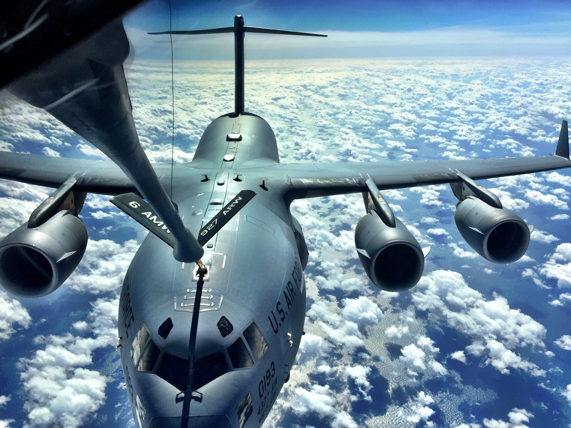 A C-17 Globemaster is refueled by a MacDill KC-135 Stratotanker during a pilot training mission off the coast of North Carolina, Feb 3, 2015. The C-17 crew was accomplishing refuel contact qualifications. (U.S. Air Force Photo by Tech. Sgt. Brandon Shapiro/Released)  