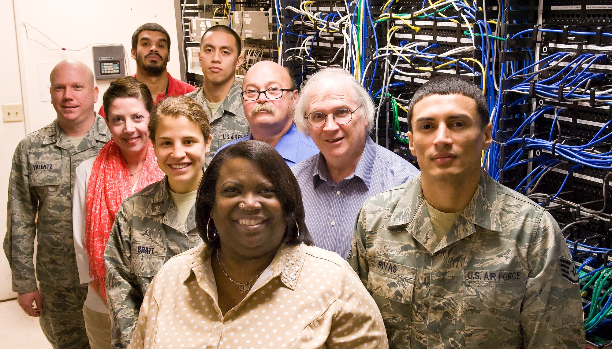 Members of the 436th Medical Support Squadron systems flight pose for photo in the server room Feb. 2, 2015, at the base clinic on Dover Air Force Base, Del. The flight won the Air Mobility Command 2014 Surgeon General's Medical Information Services award. (U.S. Air Force photo/Roland Balik)
