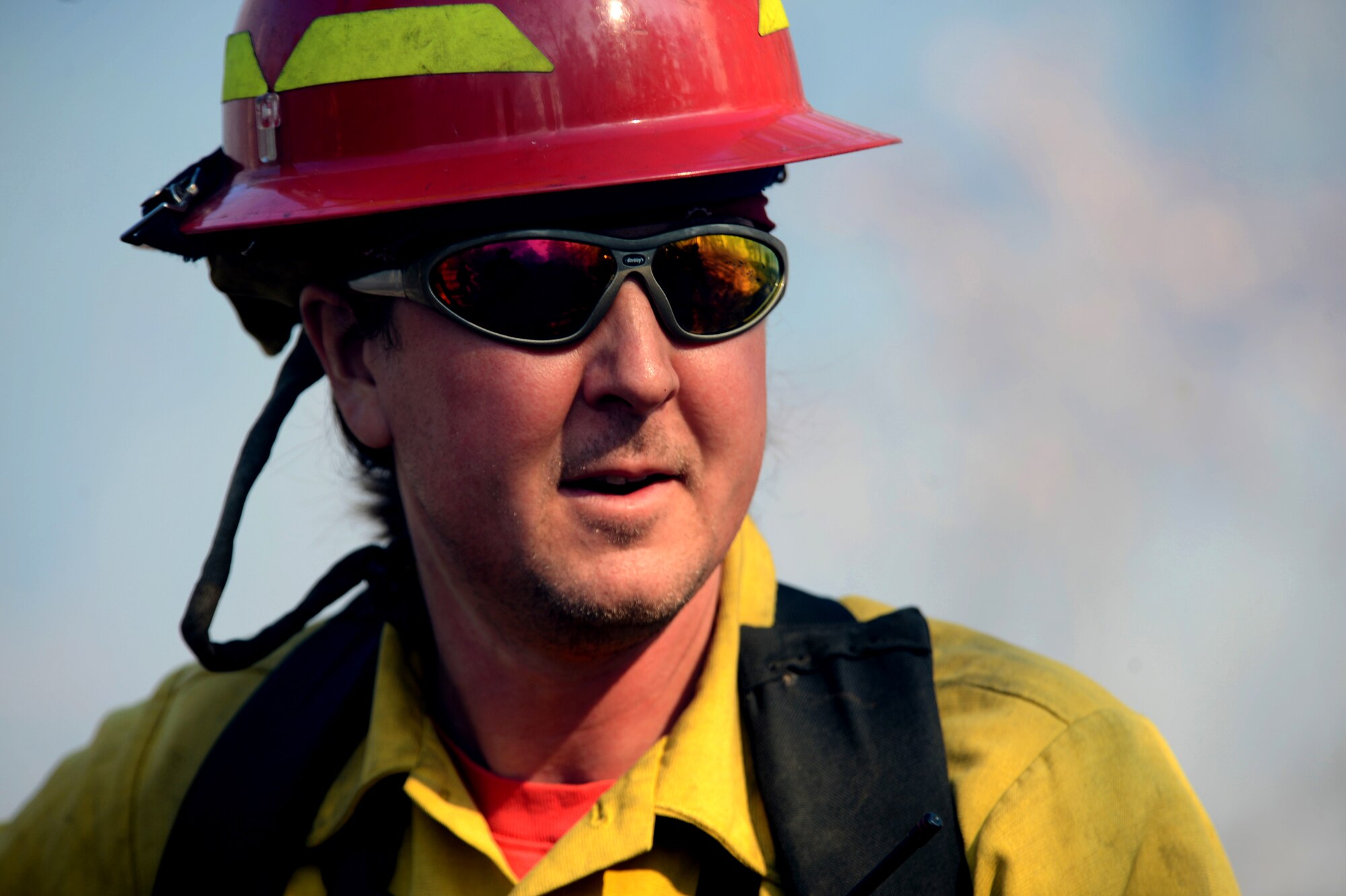 A U.S. Fish and Wildlife Service fire module detail member watches a prescribed burn at the Poinsett Electronic Combat Range, Sumter, S.C., Jan. 28, 2015.  During the burn, workers ensure that fire stays within the appropriate sections, providing a safe and controlled environment. (U.S. Air Force photo by Senior Airman Jensen Stidham/Released)