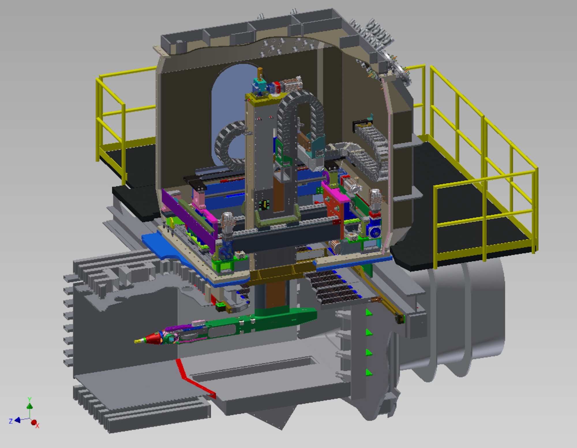 The image above is a three-dimensional cutaway view of the Captive Trajectory System (CTS) recently installed in AEDC’s 4-foot Transonic wind tunnel (4T). The new CTS, used for weapons integration testing, has improved performance capacities over the original system. It is designed to carry higher loads and achieve higher angles with more accurate positioning capacities and improved reliability. The design approach took advantage of AEDC experience, as well as technology developed in the robotics industry. This new CTS will allow AEDC to perform separation testing over an expanded 4T test envelope. Several of AEDC’s test teams assisted in the design and installation of the new CTS. The CTS and enclosure was designed by the Test Systems Design Group, instrumentation and controls were designed and fabricated by the Information and Technology Group, the fabrication and assembly was accomplished by the Model Shop and installation was accomplished by the Model Shop and the 4T test crew. The complete effort was coordinated and managed by the Investments Group.