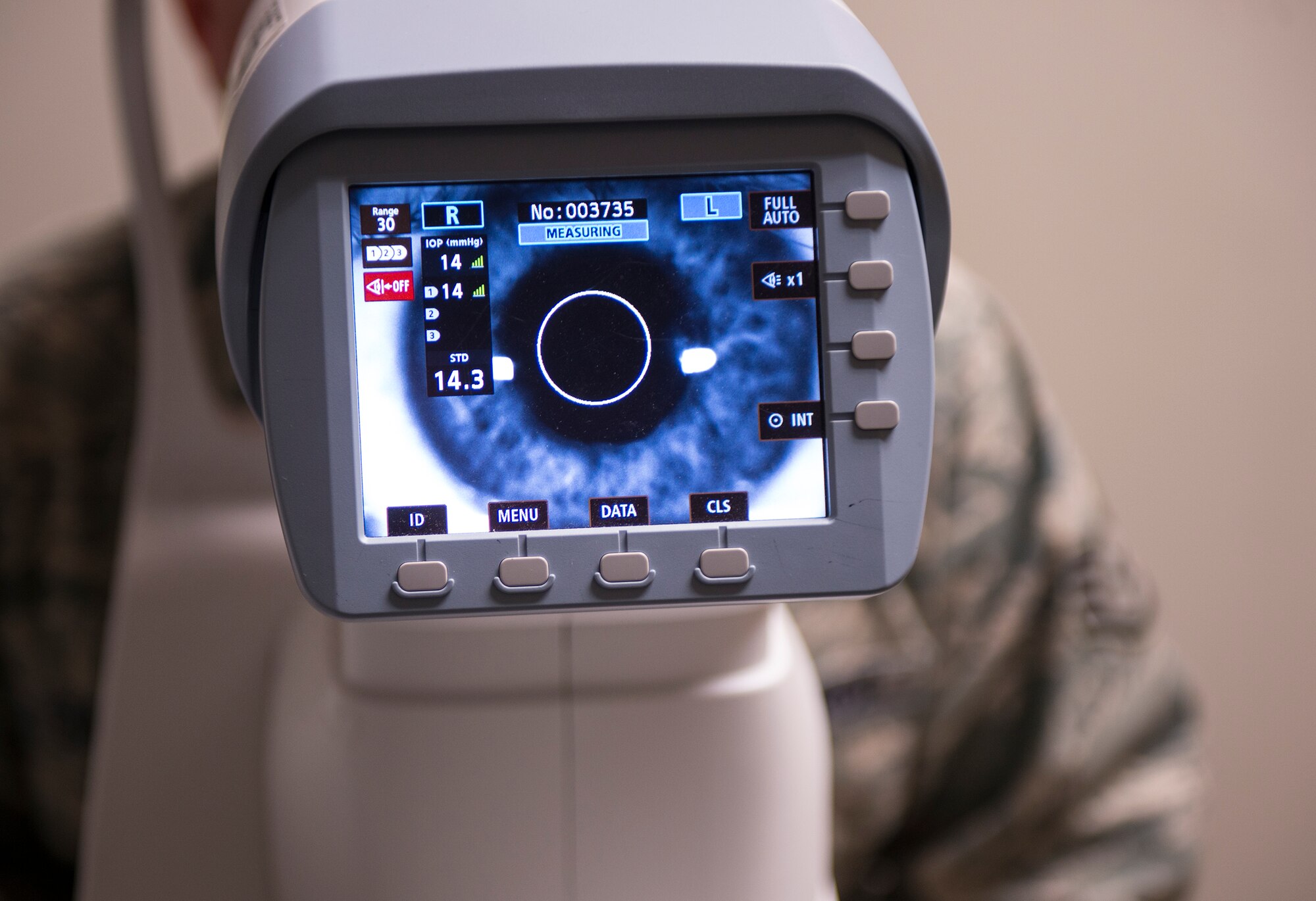 A noncontact tonometer scans the eye of U.S. Air Force Staff Sgt. Timothy Gallagher, 23d Wing public affairs broadcast journalist, during an optometry appointment Feb. 4, 2014, at Moody Air Force Base, Ga. The tonometer is used to screen for glaucoma. (U.S. Air Force photo by Airman 1st Class Ceaira Tinsley/Released)