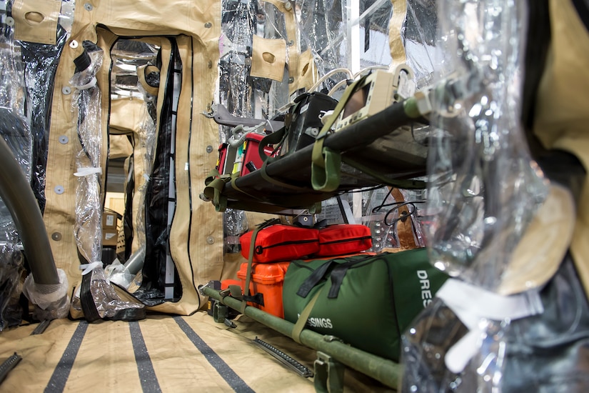 The inside of a Transport Isolation System in a hanger, Jan. 14, 2015 at Joint Base Charleston, S.C., before it is loaded onto a C-17 Globemaster III. Charleston is one of two bases in the United States that has trained with the TIS, a medical pod which  provides a way to safely transport patients with infectious diseases. (U.S. Air Force photo/Senior Airman Jared Trimarchi)   