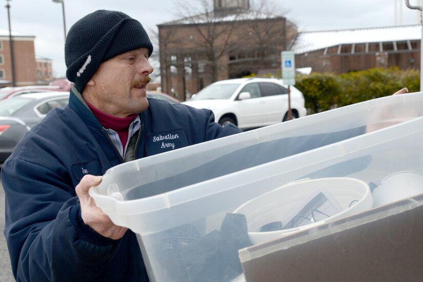 Joseph Isley, Salvation Army truck driver, loads donations from the Airman’s Attic into a truck at Langley Air Force Base, Va., Jan 27, 2015. Isley said approximately half the donations he picks up biweekly for the Salvation Army come from the Airman’s Attic. (U.S. Air Force photo by Airman 1st Class Devin Scott Michaels/Released)