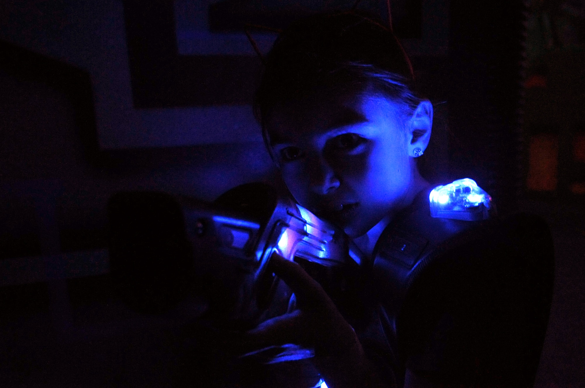 Joei Hager, 8, plays laser tag with other children from Grand Forks Air Force Base, N.D.,  at Northern Air Family Fun Center in Grand Forks, Feb. 2, 2015. Service members and children from the base were invited to take part in a military appreciation night event that also featured a trampoline park and free pizza and ice cream. (U.S. Air Force photo/Staff Sgt. Susan L. Davis)