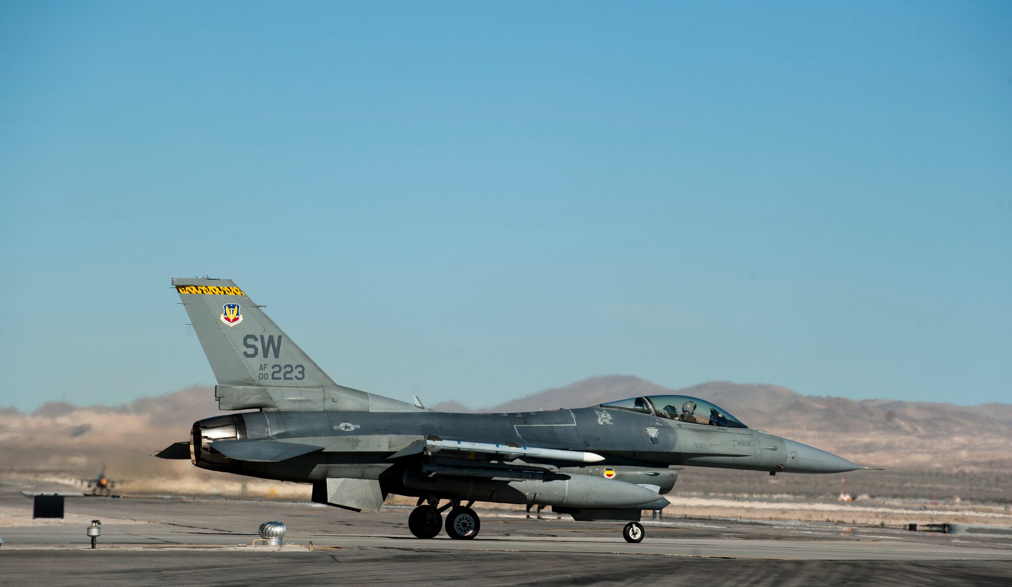An F-16C Fighting Falcon assigned to the 79th Fighter Squadron from Shaw Air Force Base, S.C., taxis to the runway during Red Flag 15-1 at Nellis AFB, Nev., Feb. 2, 2015. Red Flag is held three to four times a year and is organized by the 414th Combat Training Squadron. (U.S. Air Force photo by Senior Airman Thomas Spangler)