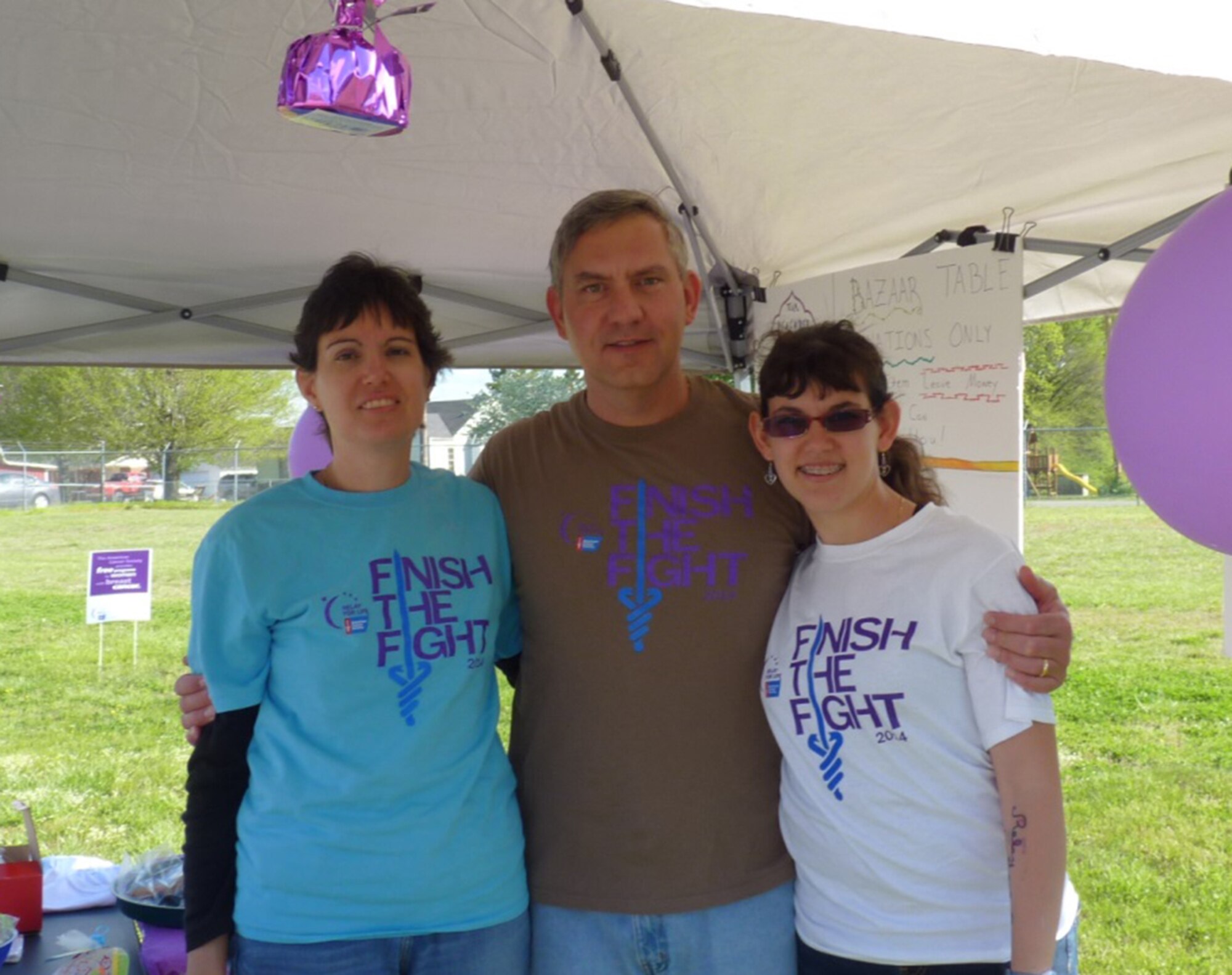 Pictured left to right at the 2014 Relay For Life are AEDC employees Dee and Shawn Wolfe, and their daughter Amber. (Photo provided)