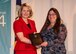 The national-level chapter leadership award was presented to Rebecca Pritchett (right) May 30, 2014, at the American Society of Military Comptrollers Professional Development Institute in Seattle, Washington. Pritchett was one of only two chapter leaders to receive the national award. (Courtesy photo)