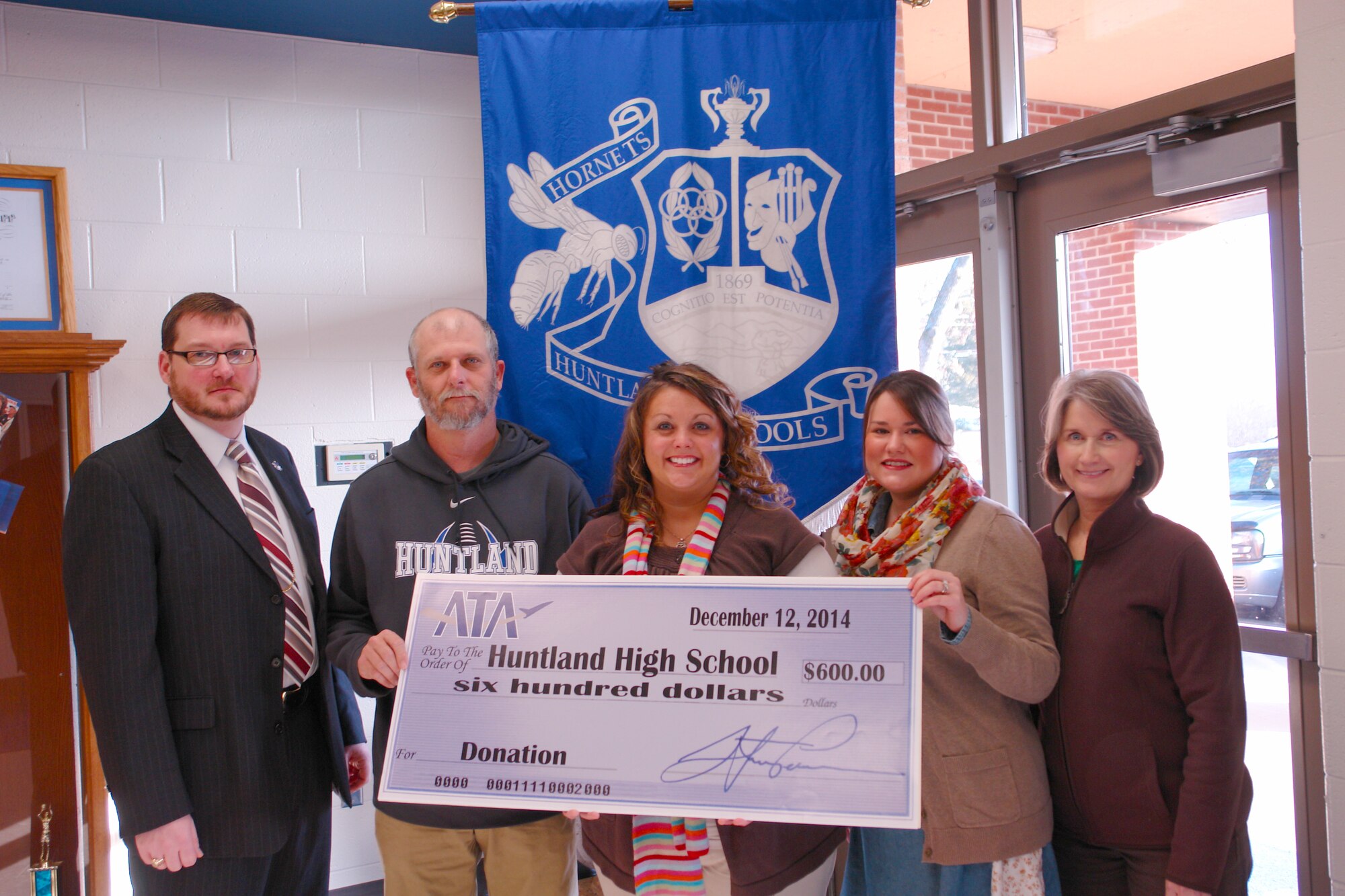 The Aerospace Testing Alliance (ATA) Employee and Community Activities Committee (E&CAC) recently made a $600 donation to Huntland High School to support their Math department, the Chromebook technology initiative, Project Graduation and the baseball team. Pictured left to right is the school’s Principal William Bishop II, baseball coach Michael Tipps, E&CAC representative Andrea Stephens, math teacher Rebecca Walker and guidance counselor Pam Joynt. (Photo by J.C. Stephens)