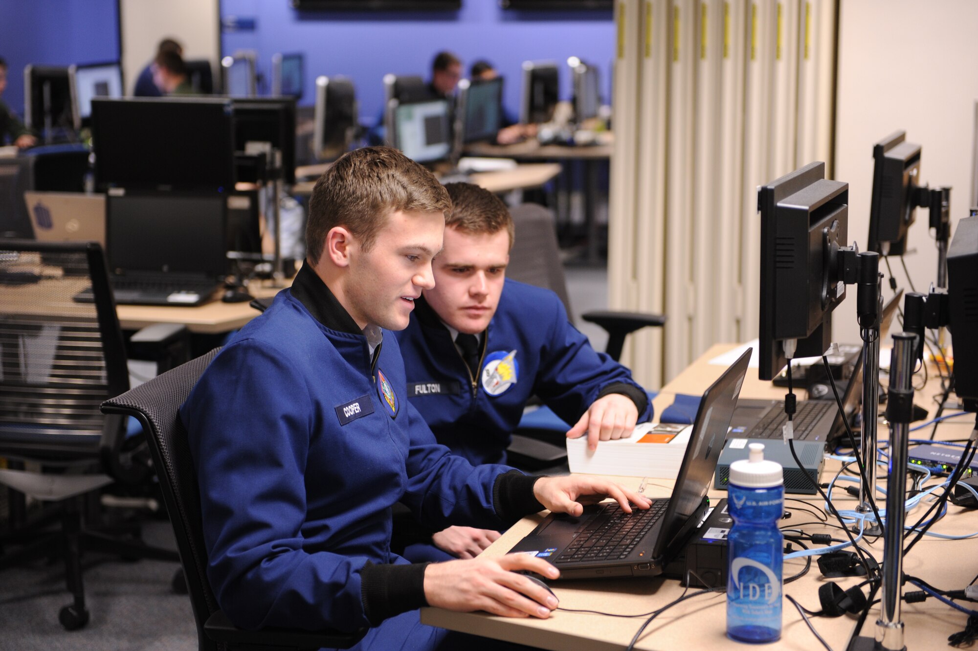 Cadet 1st Class Kevin Cooper and Cadet 3rd Class Alex Fulton,
combine talents in a memory forensics exercise.   in the Air Force Academy's
Cyber Warfare Laboratory in preparation for an upcoming competition. Next up
for the cadets is the Rocky Mountain Collegiate Cyber Defense Competition,
Feb. 27-28 at Regis University in the Denver Tech Center.

