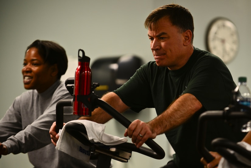 U.S. Army Col. William Galbraith, 733rd Mission Support Group commander, participates in a morning spin class at Fort Eustis, Va., Jan 15, 2015. On a typical morning, Galbraith begins the day with a 5:30 a.m., spin class or other forms of fitness to get a jump on the day ahead. (U.S. Air Force photo by Senior Airman Kimberly Nagle/Released)