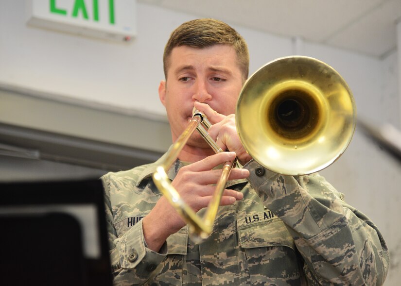 U.S. Air Force Airman 1st Class James Hubbard, Heritage of America Band trombonist, performs “Boplicity” with the Rhythm in Blue Jazz Ensemble at Crawford Hall at Langley Air Force Base, Va., Jan. 29, 2015. Hubbard said he cherishes the reactions of fans who attend the band’s concerts, and often stays behind to talk to attendees, who frequently express their gratitude for the band’s performances in their communities. (U.S. Air Force photo by Staff Sgt. Jason J. Brown/Released)