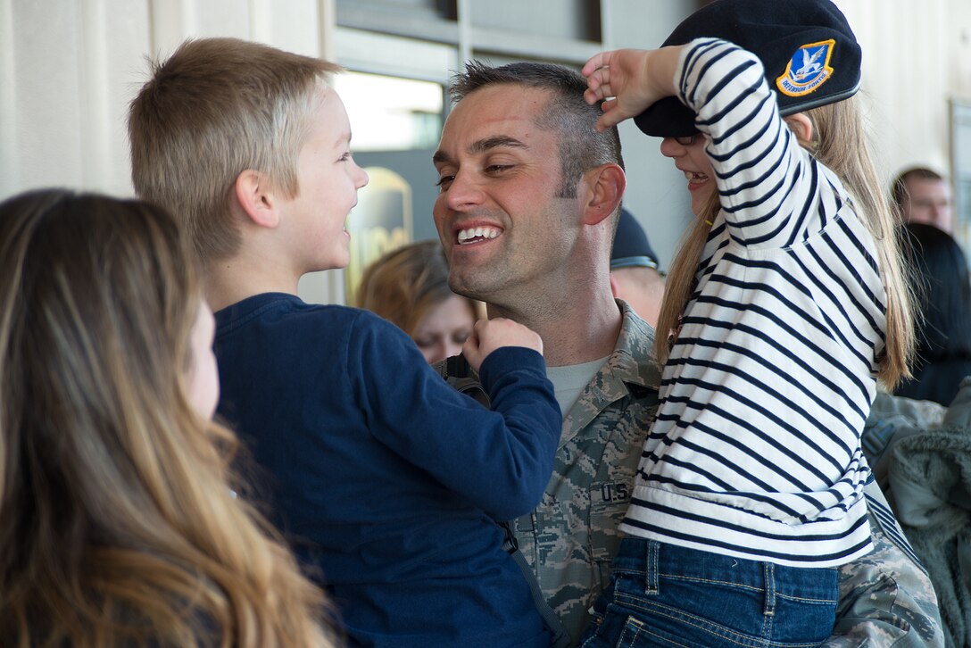 Family and friends greet members of the 137th Security Forces Squadron, OK on Feb. 3rd, 2015 at Will Rogers World Airport, Oklahoma City after returning home from a six-month deployment to Southwest Asia.
