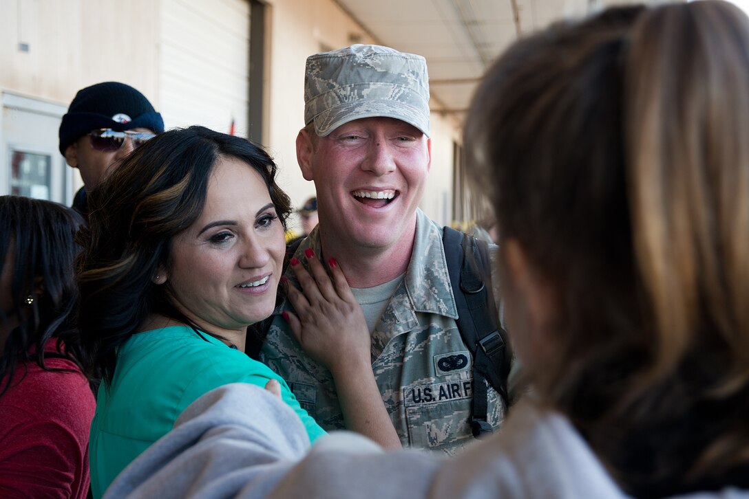 Family and friends greet members of the 137th Security Forces Squadron, OK on Feb. 3rd, 2015 at Will Rogers World Airport, Oklahoma City after returning home from a six-month deployment to Southwest Asia.
