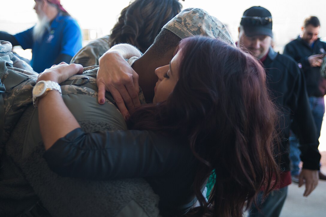 Family and friends greet members of the 137th Security Forces Squadron, OK on Feb. 3rd, 2015 at Will Rogers World Airport, Oklahoma City after returning home from a six-month deployment to Southwest Asia.
