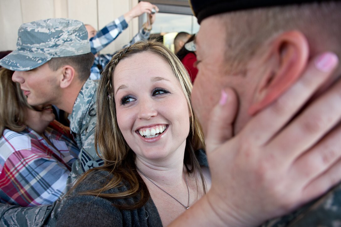 Family and friends greet members of the 137th Security Forces Squadron, OK on Feb. 3rd, 2015 at Will Rogers World Airport, Oklahoma City after returning home from a six-month deployment to Southwest Asia.
