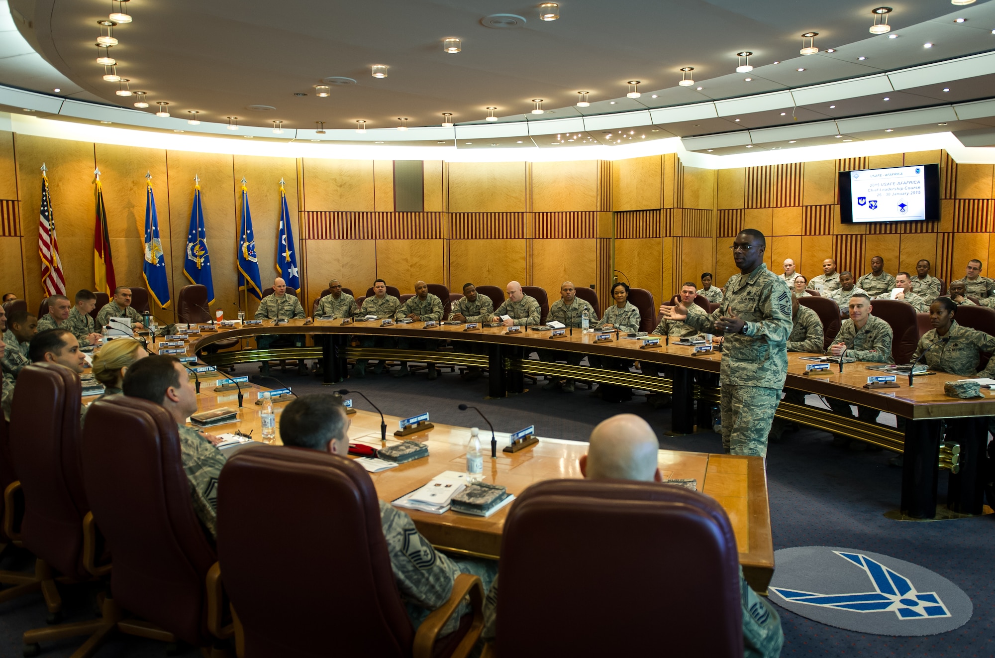 Chief Master Sgt. James E. Davis, U.S. Air Forces in Europe and Air Forces Africa command chief, speaks to a group of chief master sergeant selects from around the command during the Chiefs Leadership Course Jan. 27, 2015 at Ramstein Air Base, Germany. The CLC is designed to offer newly selected chiefs an opportunity to speak with senior leaders, and exchange ideas in a candid setting. (U.S. Air Force photo/ Staff Sgt. Ryan Crane)