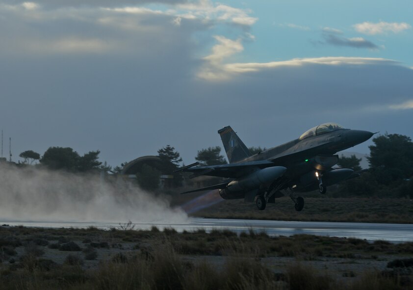 A Hellenic air force F-16 Fighting Falcon fighter aircraft assigned to the 340th Fighter Squadron takes off during a flying training deployment on the flightline at Souda Bay, Greece, Feb. 3, 2015. The aircraft conducted the training as part of the bilateral deployment between the Greek and U.S. Air Forces to develop interoperability and cohesion between the two NATO partners. (U.S. Air Force photo by Staff Sgt. Joe W. McFadden/Released)