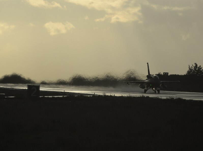 A Hellenic air force F-16 Fighting Falcon fighter aircraft assigned to the 340th Fighter Squadron takes off during a flying training deployment on the flightline at Souda Bay, Greece, Feb. 3, 2015. The aircraft conducted the training as part of the bilateral deployment between the Greek and U.S. Air Forces to develop interoperability and cohesion between the two NATO partners. (U.S. Air Force photo by Staff Sgt. Joe W. McFadden/Released)