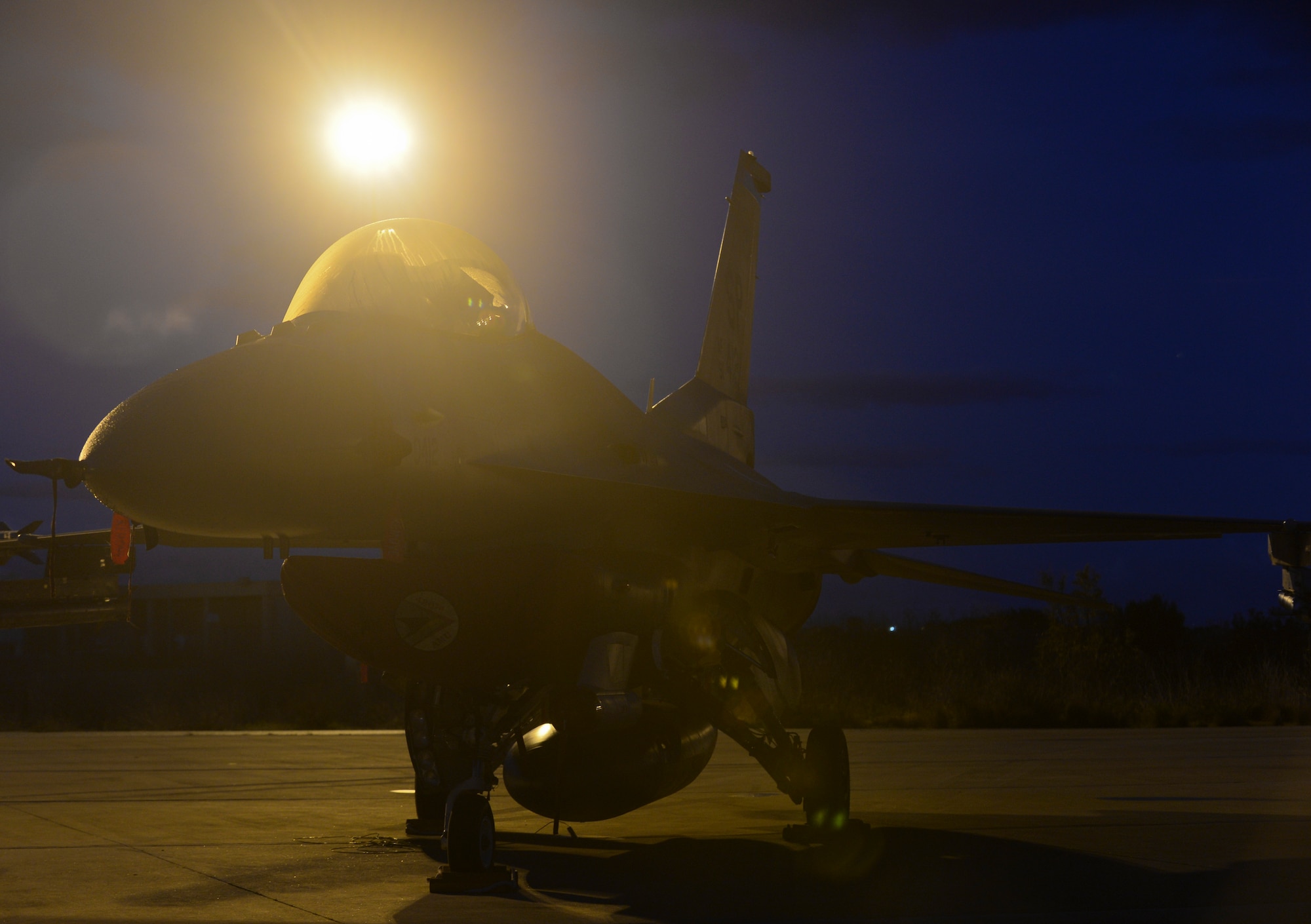 A U.S. Air Force F-16 Fighting Falcon fighter aircraft assigned to the 480th Expeditionary Fighter Squadron remains parked on the flightline during a flying training deployment at Souda Bay, Greece, Jan. 30, 2015. Eighteen F-16s from the 52nd Fighter Wing at Spangdahlem Air Base, Germany, participated in the deployment, which marked the third of its kind on the island since 2014. (U.S. Air Force photo by Staff Sgt. Joe W. McFadden/Released)