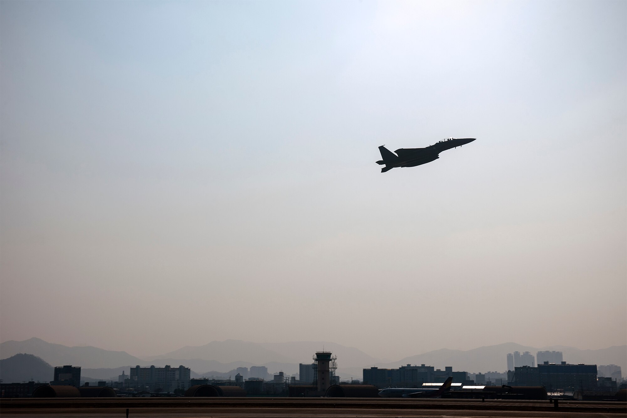 An F-15K Slam Eagle from the 11th Fighter Wing flies during Exercise Buddy Wing 15-2 at Daegu Air Base, Republic of Korea, Feb. 4, 2015. Wolf Pack Airmen deployed to Daegu to mission plan, brief, fly and debrief together as one force during the four-day exercise. (U.S. Air Force photo by Senior Airman Katrina Heikkinen/Released)