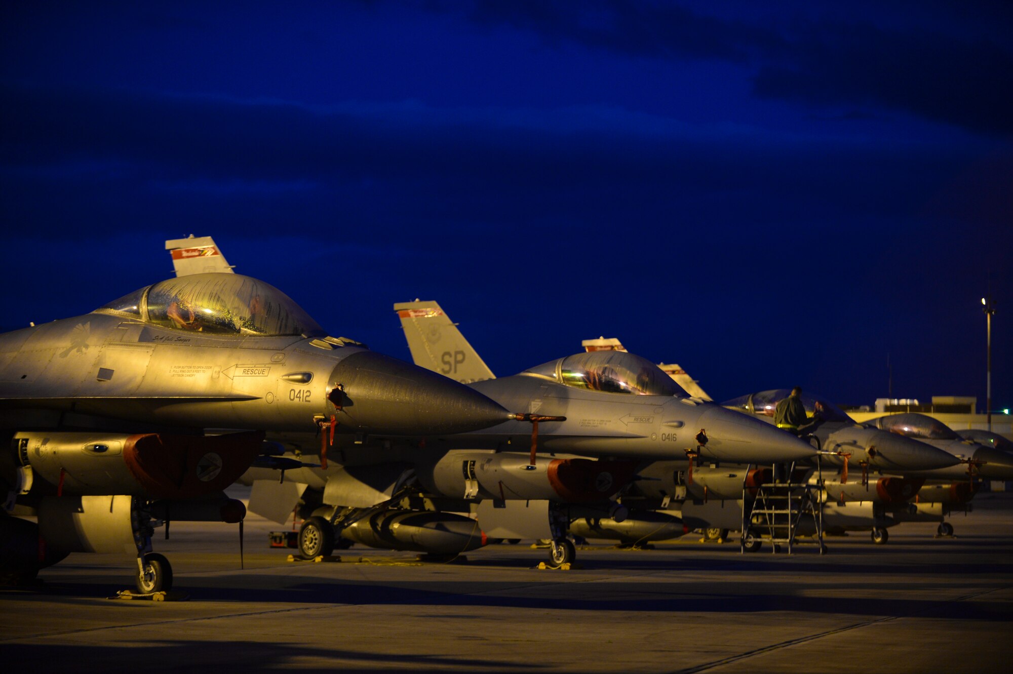 A row of U.S. Air Force F-16 Fighting Falcon fighter aircraft assigned to the 480th Expeditionary Fighter Squadron remain parked on the flightline during a flying training deployment at Souda Bay, Greece, Jan. 30, 2015. The aircraft conducted the training as part of the bilateral deployment between the Greek and U.S. Air Forces to develop interoperability and cohesion between the two NATO partners. (U.S. Air Force photo by Staff Sgt. Joe W. McFadden/Released)