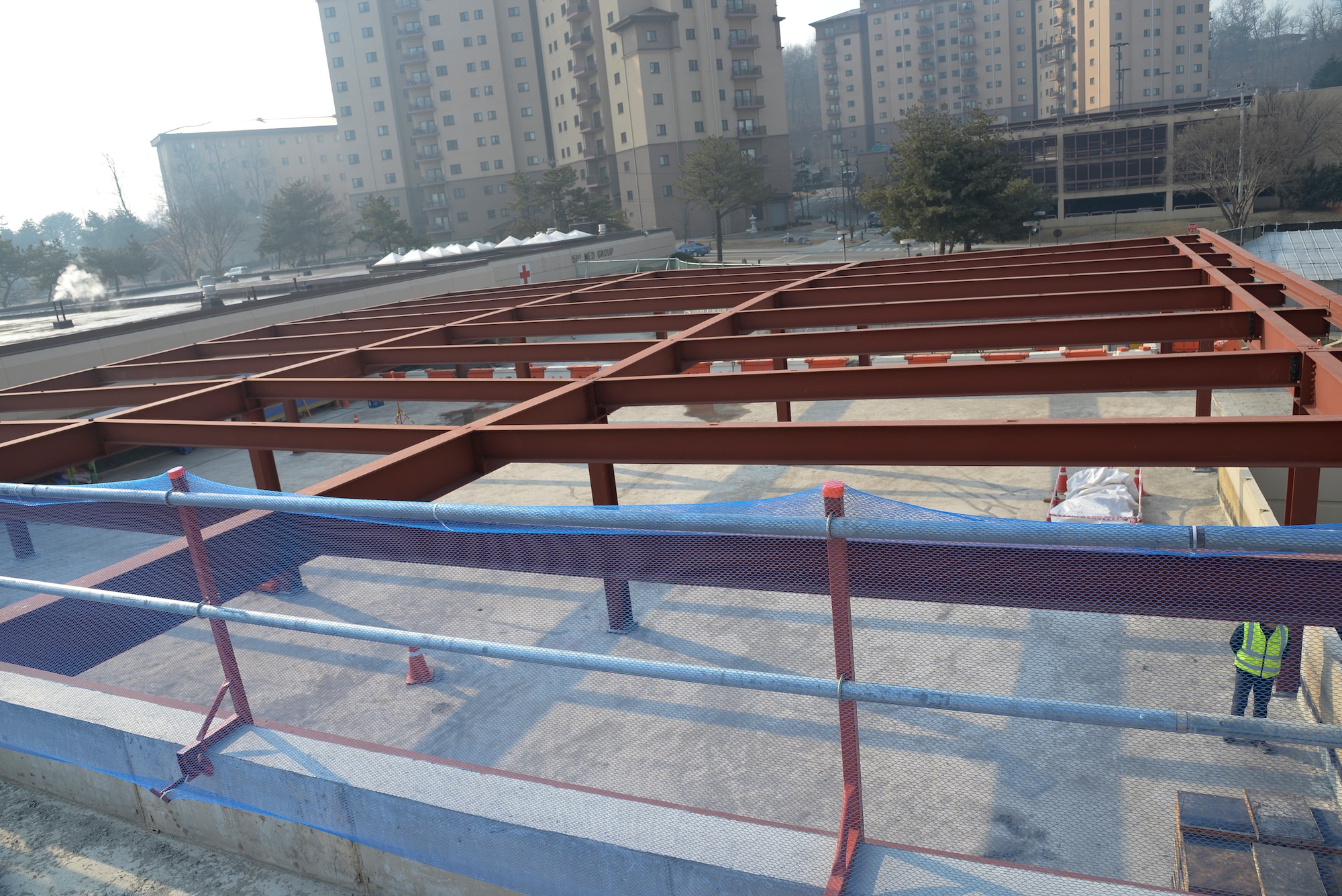 There are more than 400 on-going, in-design or planned construction projects on Osan Air Base, like an extension to the Medical Group pictured here Feb. 4, 2015, at Osan Air Base, Republic of Korea. One of Team Osan's main principles is reinforcing stability in the ROK, a feat that is in part accomplished by the construction of quality of life establishments. (U.S. Air Force photo by Senior Airman Matthew Lancaster). 