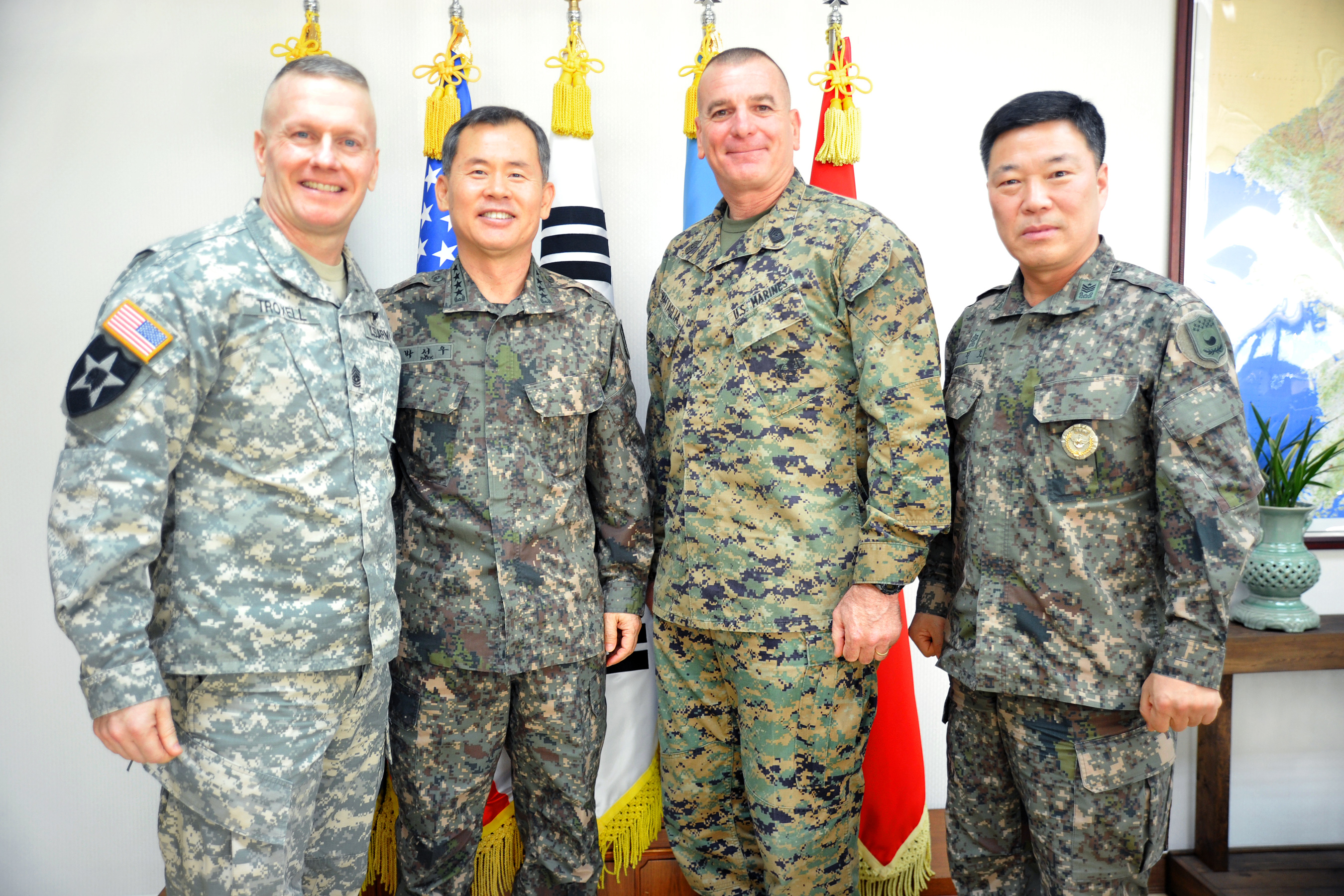 U.S. Army Command Sgt. Maj. John Troxell, left, senior enlisted advisor ...