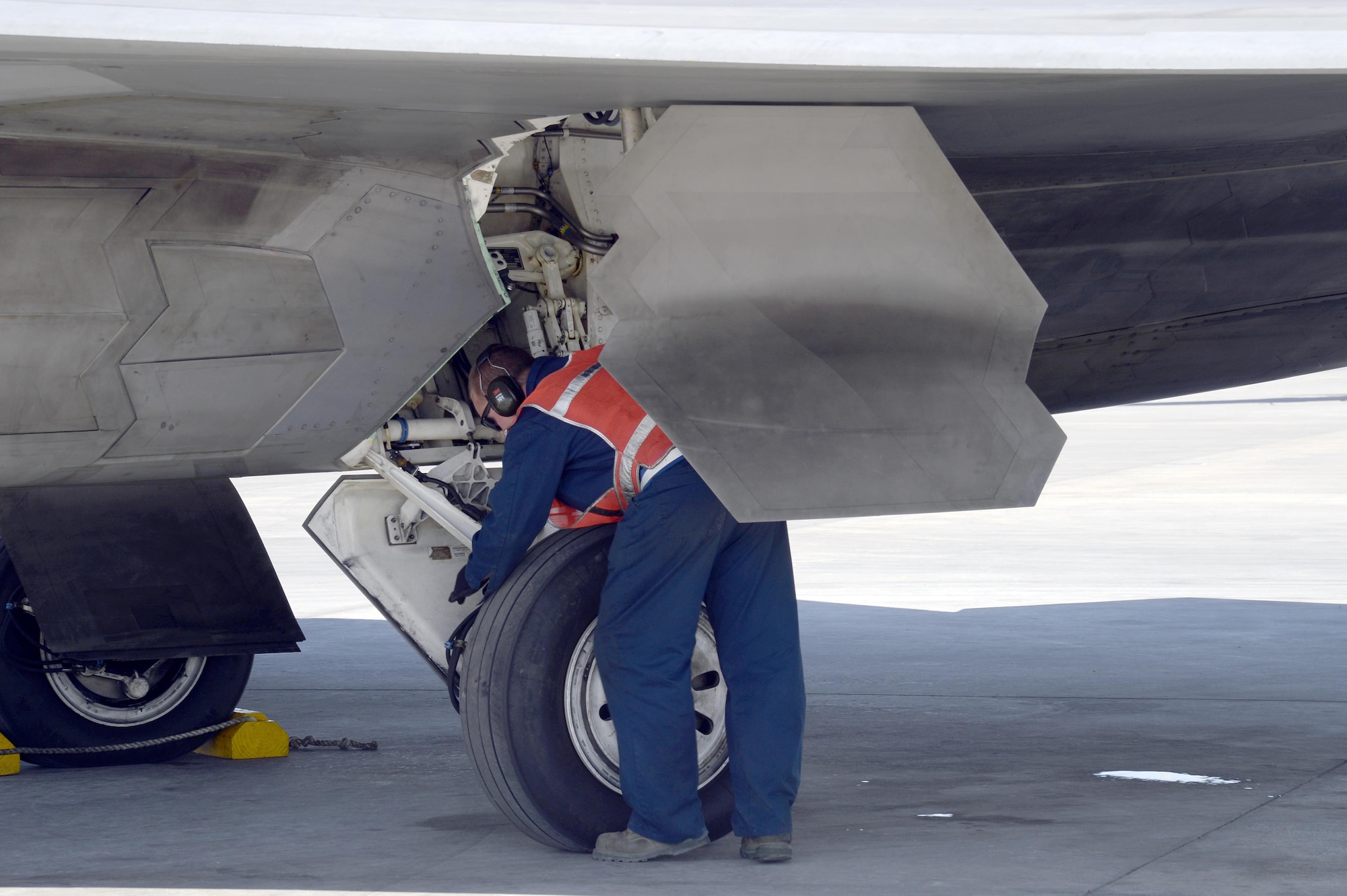 Airman 1st Class David, crew chief, performs a final inspection of an F-22 Raptor prior to taxi for take-off at an undisclosed location in Southwest Asia Jan. 26, 2015. Prior to sending the pilot to the end of the runway for a final inspection, Airmen will perform a ‘wing tip to wing tip’ inspection, ensuring that all the things they see from the outside of the aircraft are ready for flight. David is currently deployed from Tyndall Air Force Base, Fla., and is a native of Richards, Missouri. (U.S. Air Force/Tech. Sgt. Marie Brown)