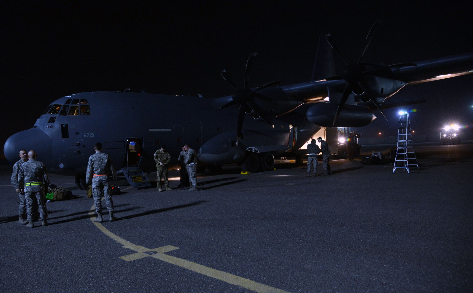 SOUTHWEST ASIA – The first HC-130J along with members of the 26th and 52nd Expeditionary Rescue squadrons, and 386th Expeditionary Aircraft Maintenance Squadron arrive here Jan. 25. The 26th ERQS is tasked to conduct fixed-wing personnel recovery missions, and the 52nd ERQS is tasked to conduct fixed-wing, rotary-wing and land-based personnel recovery missions in support of Operation INHERENT RESOLVE. (U.S. Air Force photo by Tech. Sgt. Jared Marquis/released)