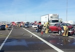 Army Staff Sgt. Brian Bowling and Pfc. LynnRae Acothley rendered aid at the scene of a five-vehicle collision on the east-bound Loop 202 in Tempe, Arizona, until first responders could arrive on scene Jan. 28, 2015. 